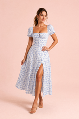 Vestido azul decote quadrado mangas bufantes