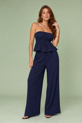 Fato de calças largas com bustier folhos