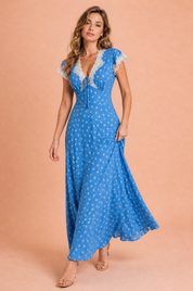 Robe longue bleue à pois col V | Vue en mouvement | Lounelle Paris