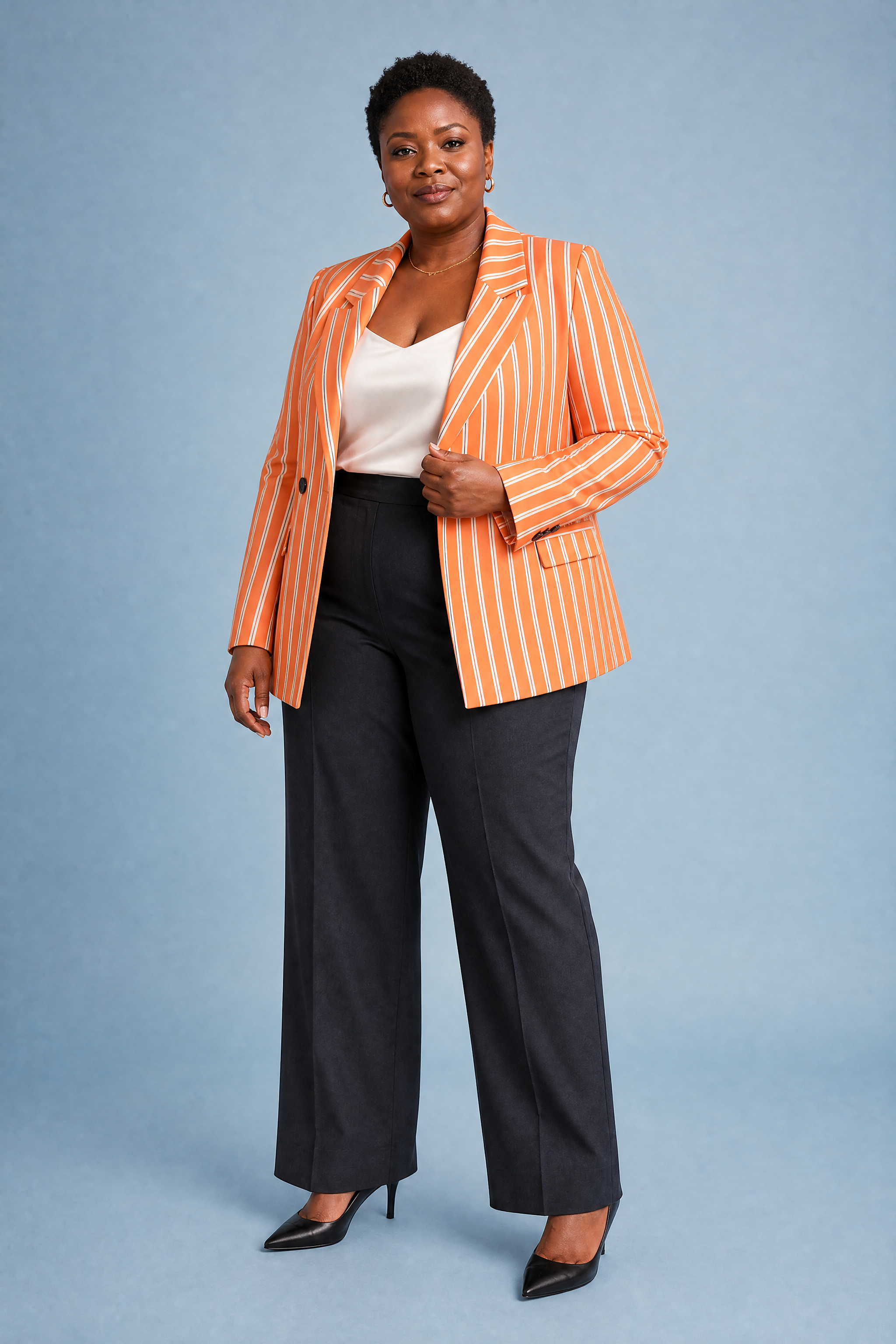 Blazer orange rayé coupe ample | Porté sur une silhouette plus ronde | Lounelle Paris