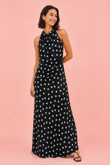 Vestido preto com bolinhas e gola halter