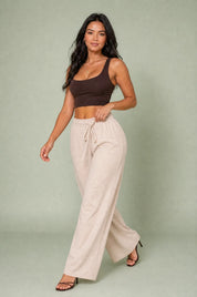 Pantalon large abricot taille élastique | Vue en mouvement | Lounelle Paris