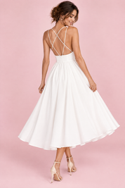 Robe midi blanche à fines bretelles et jupe ample | Vue de dos | Lounelle Paris