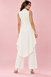 Ensemble pantalon blanc fluide avec top sans manches à col montant | Vue de dos | Lounelle Paris