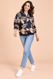 Veste bomber fleurie ajustée bleu mer | Vue en mouvement | Lounelle Paris