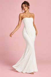 Robe longue blanche à col montant et détails volantés | Vue en mouvement | Lounelle Paris