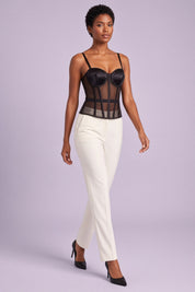 Top bustier noir à empiècements transparents | Vue en mouvement | Lounelle Paris
