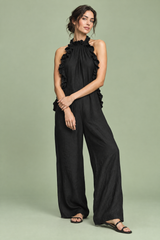 Vestido comprido preto com folhos e decote halter