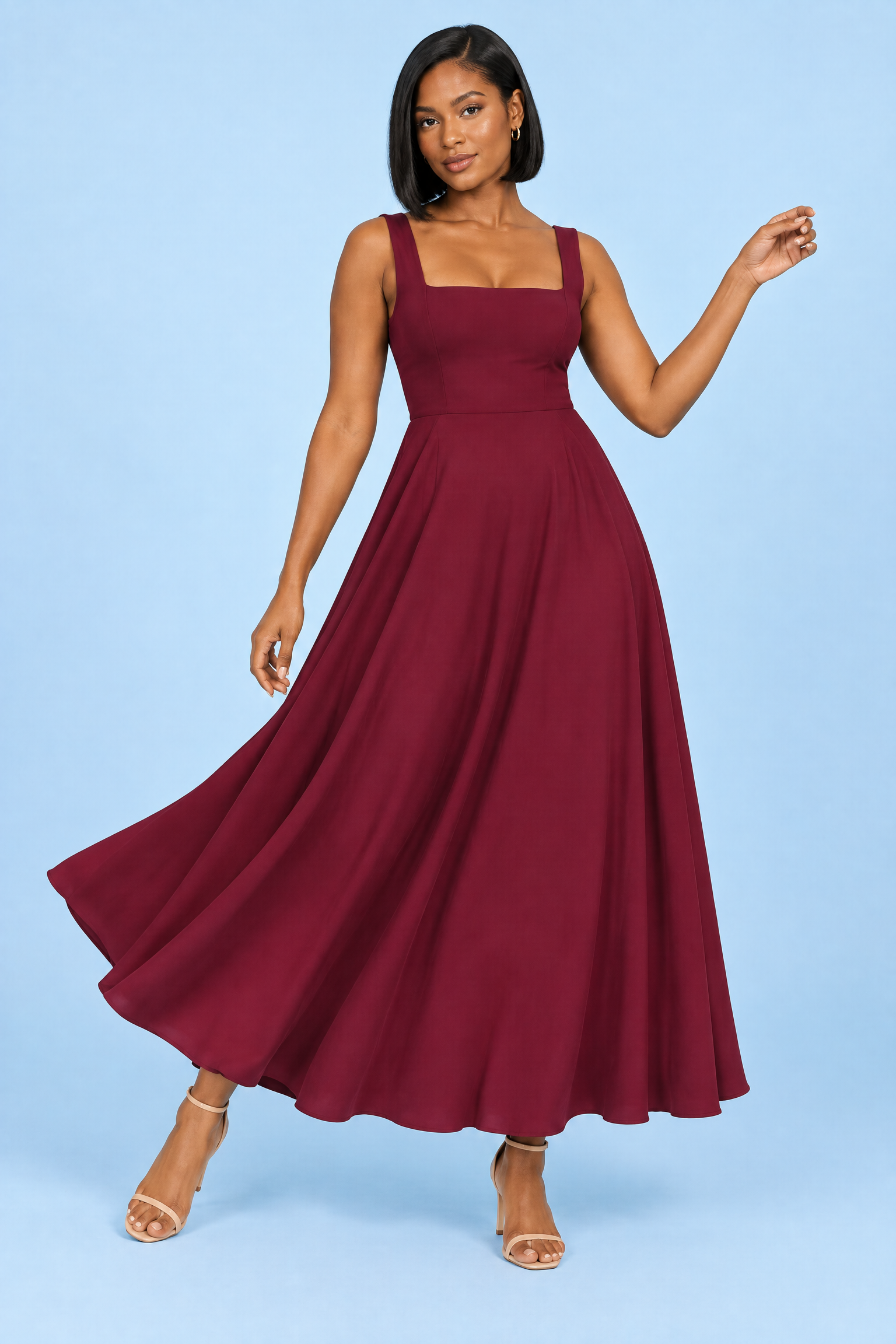 Robe midi bordeaux à fines bretelles et ourlet ample | Vue en mouvement | Lounelle Paris