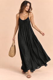 Robe longue fluide dos nu noire | Vue en mouvement | Lounelle Paris