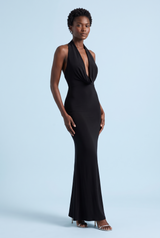 Vestido maxi preto, sem costas, com decote drapeado e corte sereia
