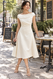 Robe trapèze blanc crème midi | Photo lifestyle | Lounelle Paris