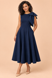 Robe midi bleu marine à encolure asymétrique et manche à nœud | Vue de face | Lounelle Paris