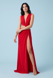 Robe longue rouge à encolure asymétrique, découpes à la taille et détails dorés | Vue de face | Lounelle Paris