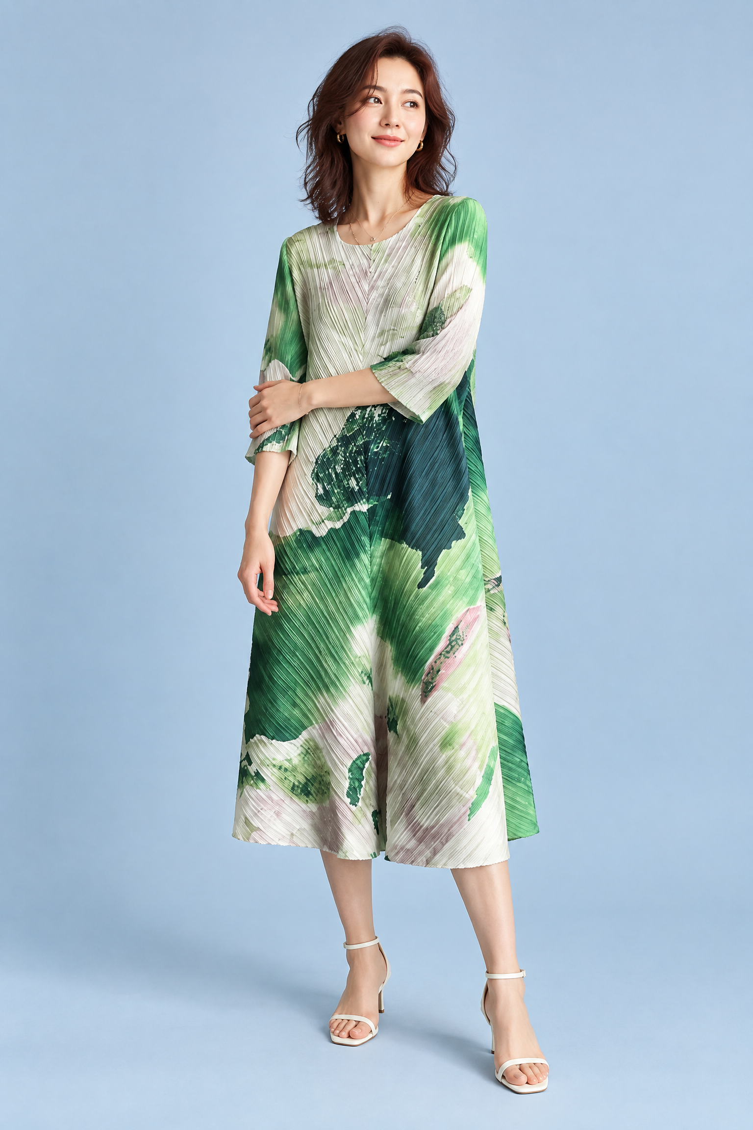 Robe midi plissée verte à imprimé abstrait | Vue de face | Lounelle Paris