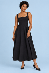 Vestido midi preto de alças finas com barra volumosa
