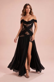 Robe noire à découpes et col bénitier | Vue en mouvement | Lounelle Paris
