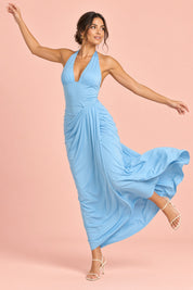 Robe longue bleue à décolleté plongeant | Vue en mouvement | Lounelle Paris