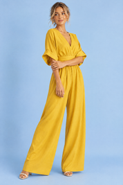 Combinaison pantalon jaune à col V et jambes larges | Vue de dos | Lounelle Paris
