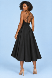 Robe midi noire à fines bretelles et jupe ample | Vue de dos | Lounelle Paris