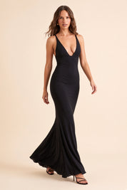 Robe longue noire près du corps à décolleté V | Vue en mouvement | Lounelle Paris