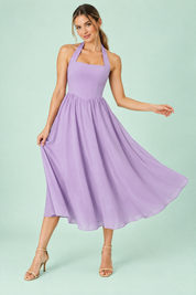 Robe midi patineuse violet clair à encolure américaine | Vue en mouvement | Lounelle Paris