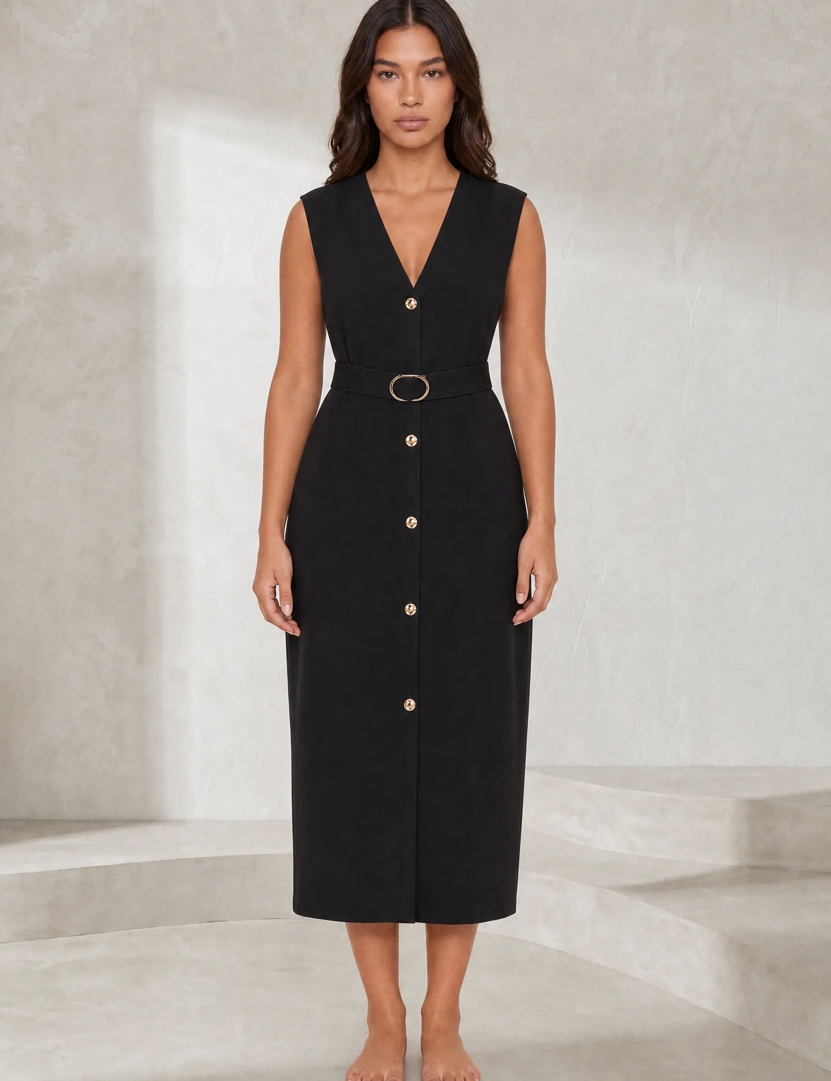 Robe noire col V ceinturée | Lounelle Paris